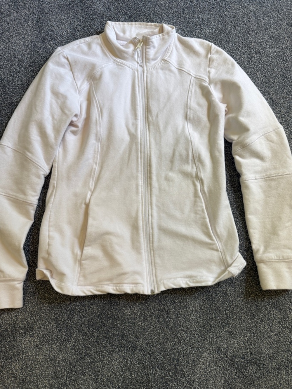 White Cross white scrub jacket with two front pockets. Size small
